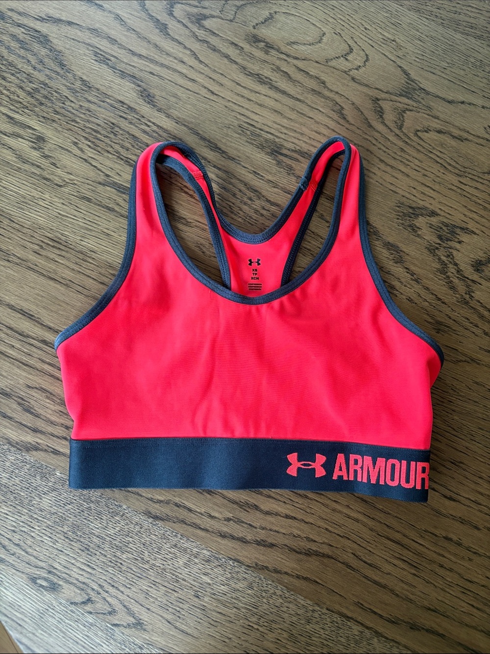 Under Armour Bright pink Racerback Sports Bra with Charcoal Band